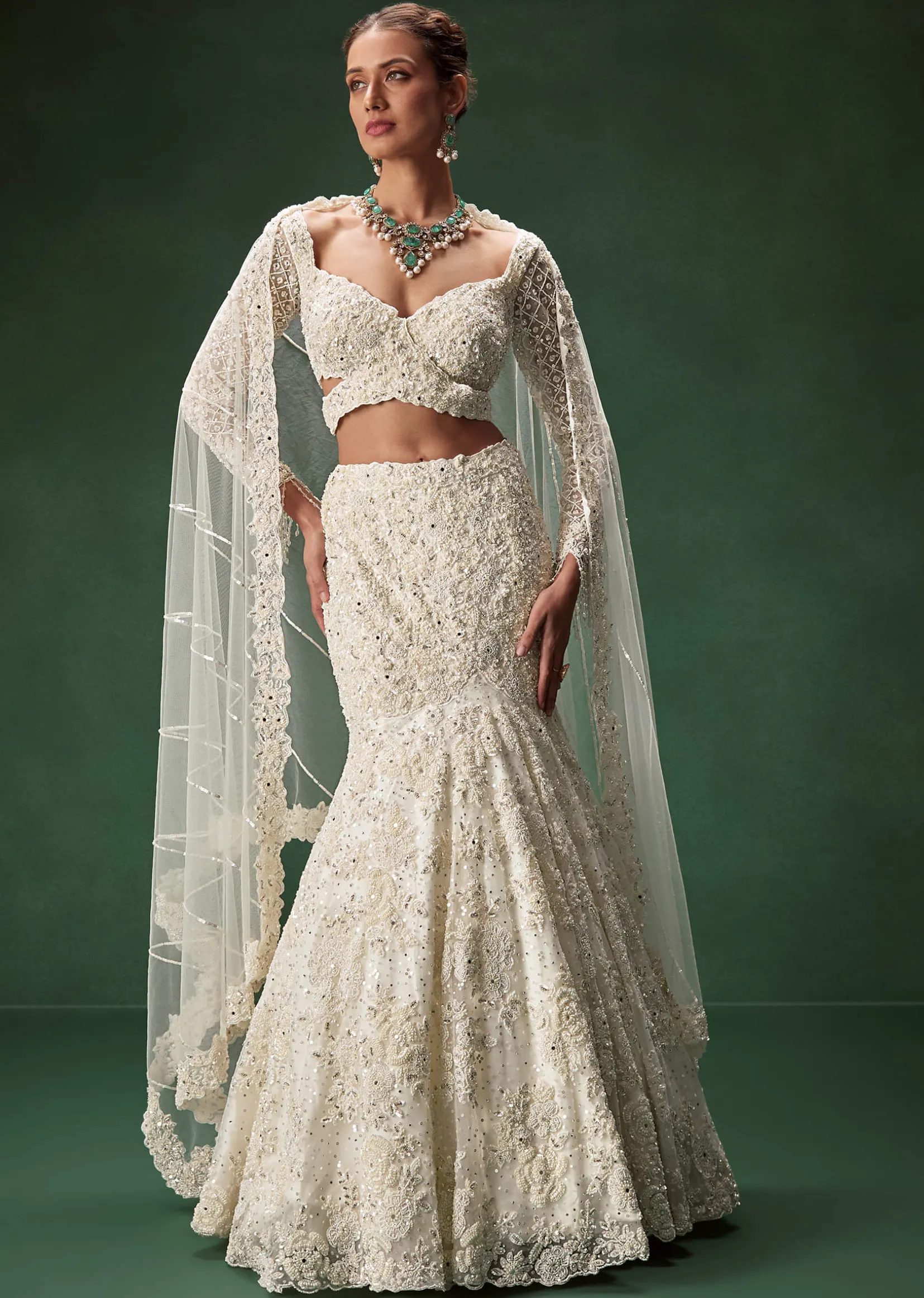 Ivory Mermaid Bridal Lehenga With Full Sleeves And Heavy Embroidery