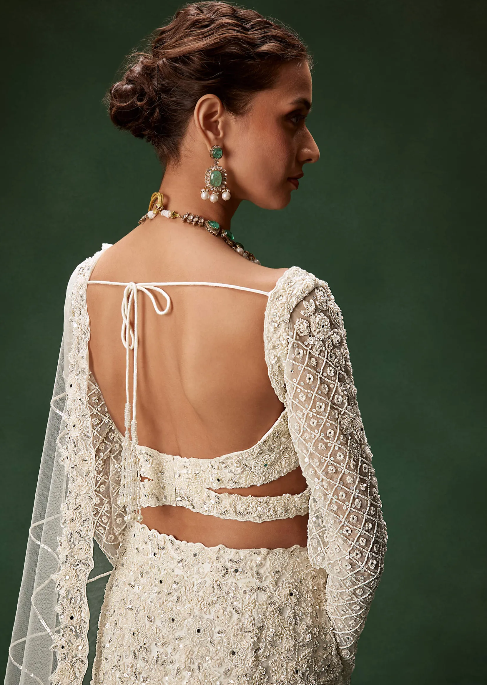 Ivory Mermaid Bridal Lehenga With Full Sleeves And Heavy Embroidery