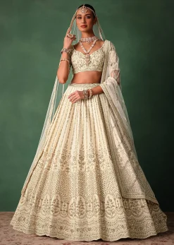 Ivory Raw Silk Hand Embroidered Lehenga Set In Cutdana Work