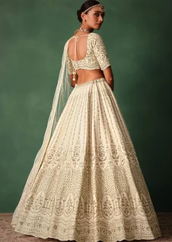 Ivory Raw Silk Hand Embroidered Lehenga Set In Cutdana Work