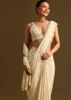 Ivory Tissue Saree With Cutdana Embroidered Border and Unstitched Blouse