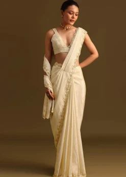 Ivory Tissue Saree With Cutdana Embroidered Border and Unstitched Blouse
