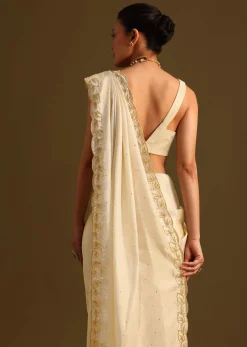 Ivory Tissue Saree With Cutdana Embroidered Border and Unstitched Blouse