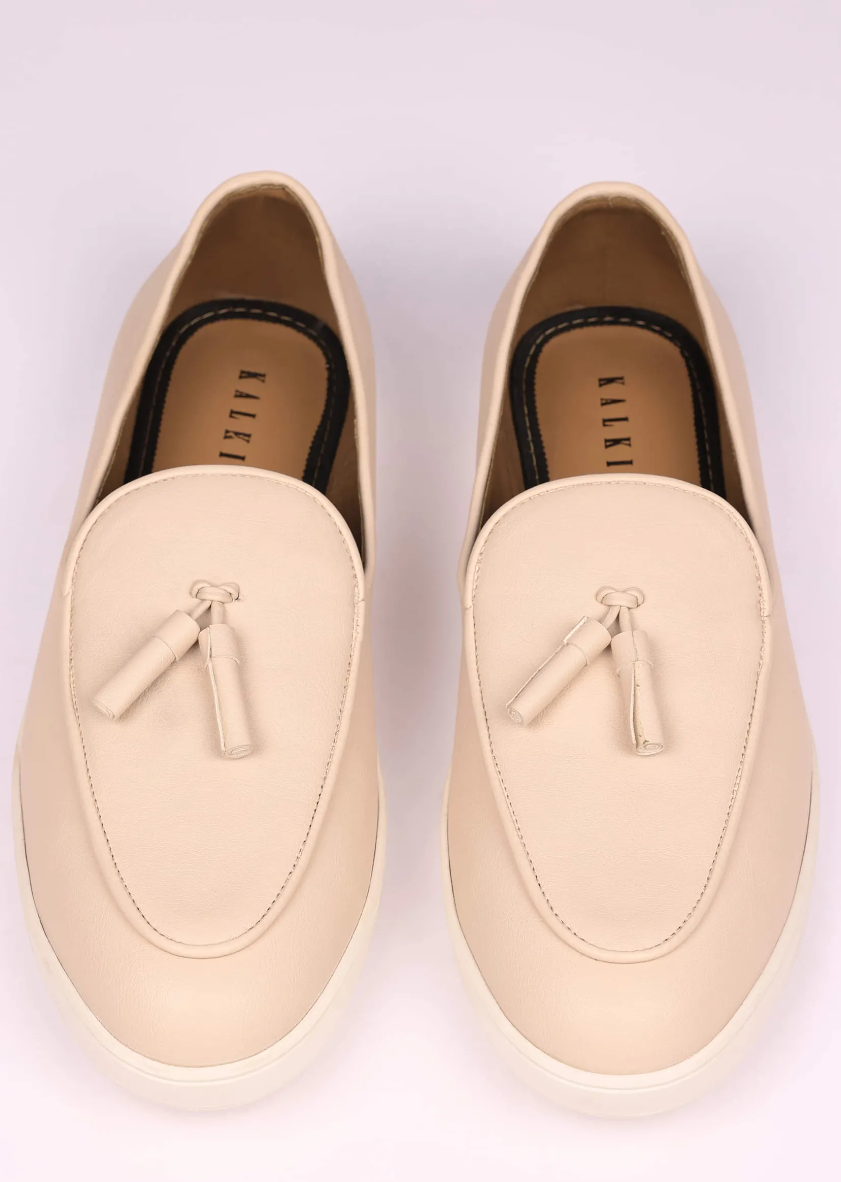 Ivory Vegan Leather Tassel Jutti