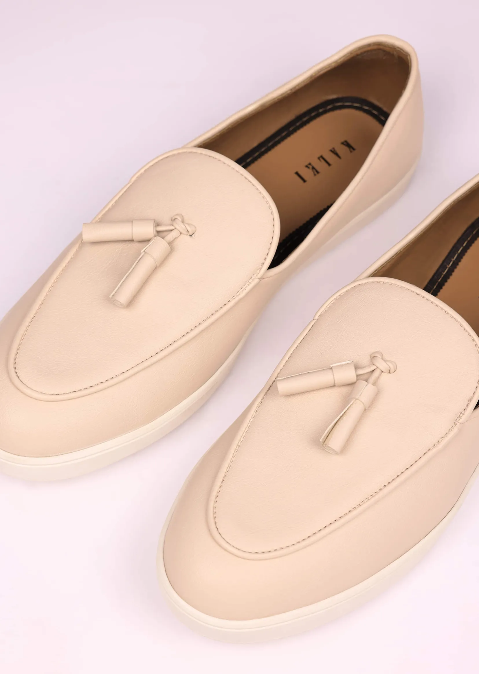 Ivory Vegan Leather Tassel Jutti