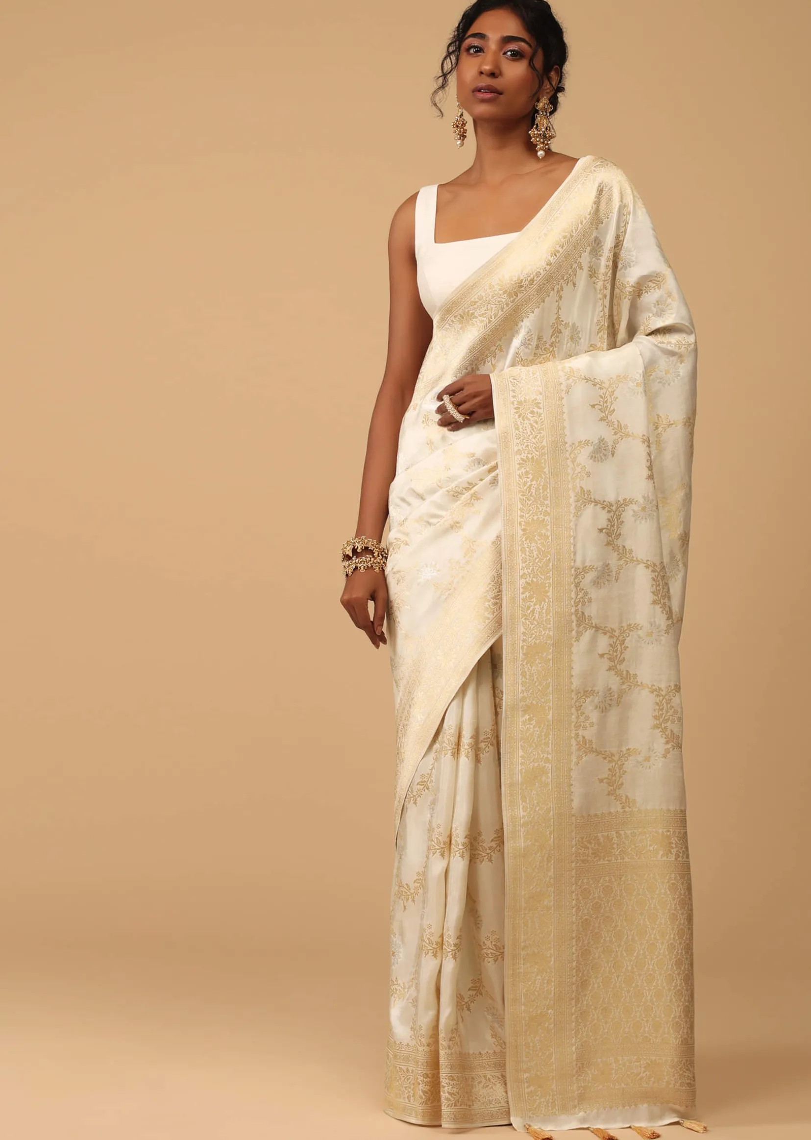 Ivory White Dola Silk Saree With Silver And Gold Jaal Embroidery In Floral Pattern