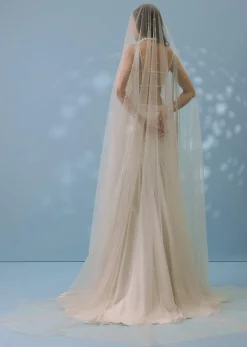 Ivory White Embroidered Trail Lehenga Set In Milano Satin With Tassel Blouse