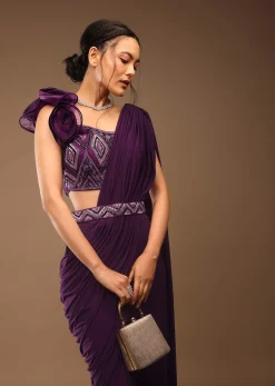 Jewel Purple Pre Stitched Saree With A 3D Flowers Crop Top In Stones And Multi-Colored Embroidery