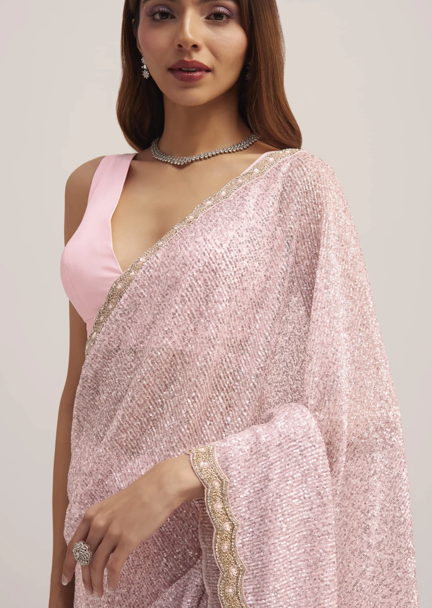 Lavender Purple Sequins Saree With An Embellished Border