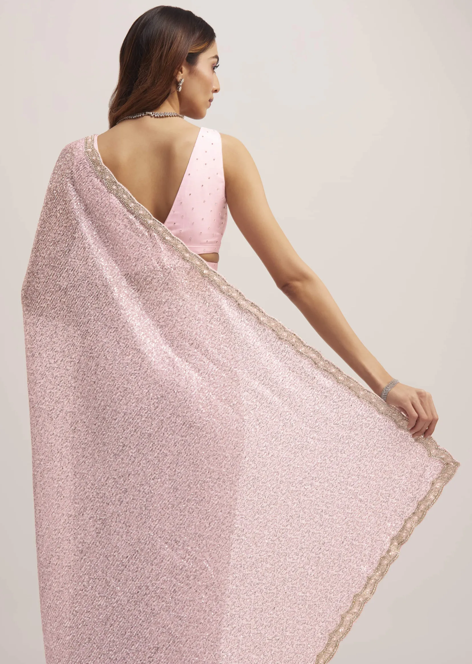 Lavender Purple Sequins Saree With An Embellished Border