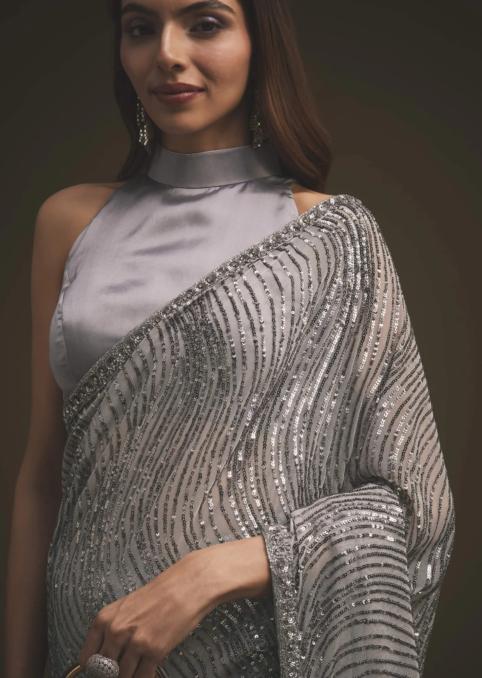 Lavender Purple Sequins Saree With An Embellished Border