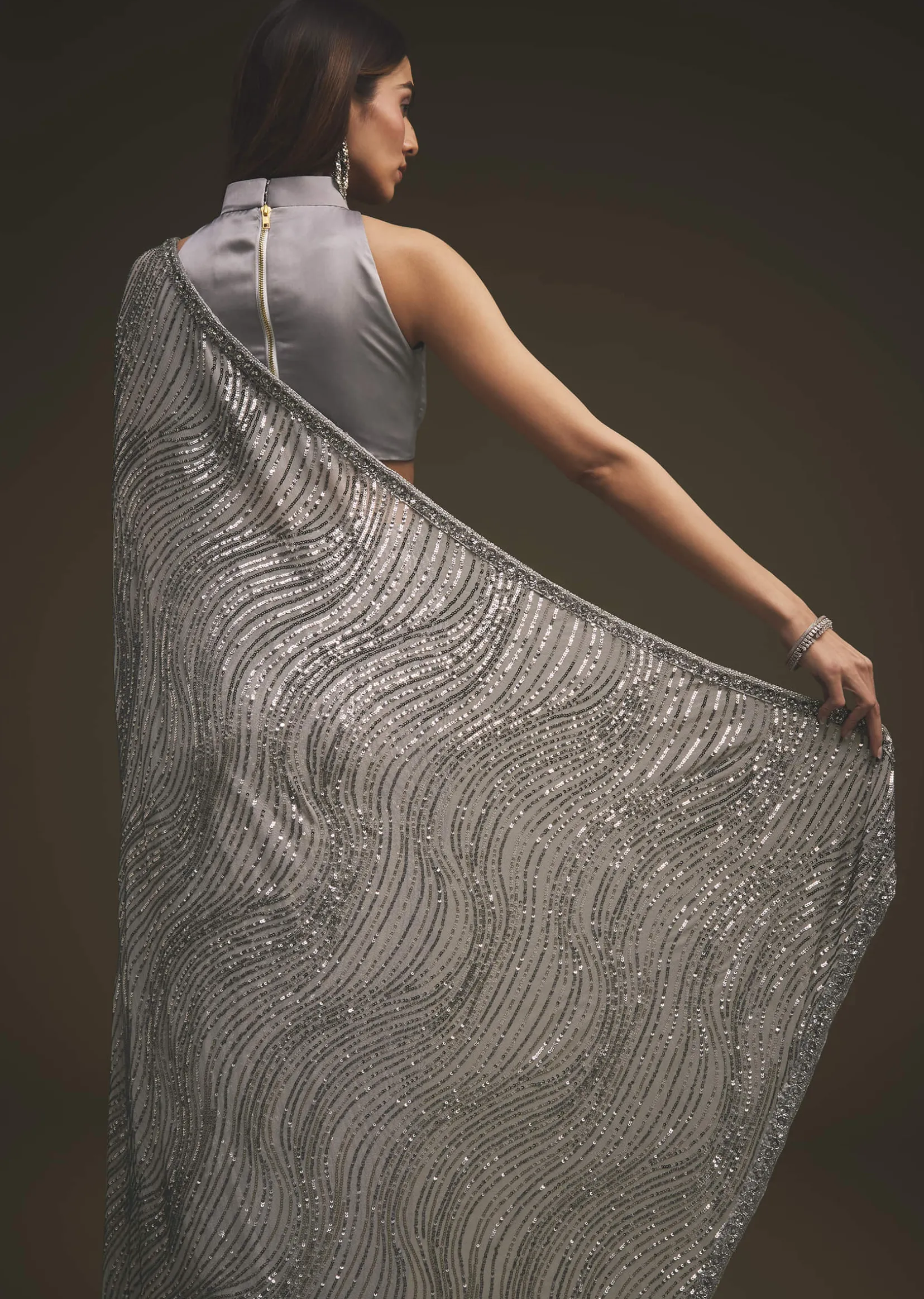 Lavender Purple Sequins Saree With An Embellished Border