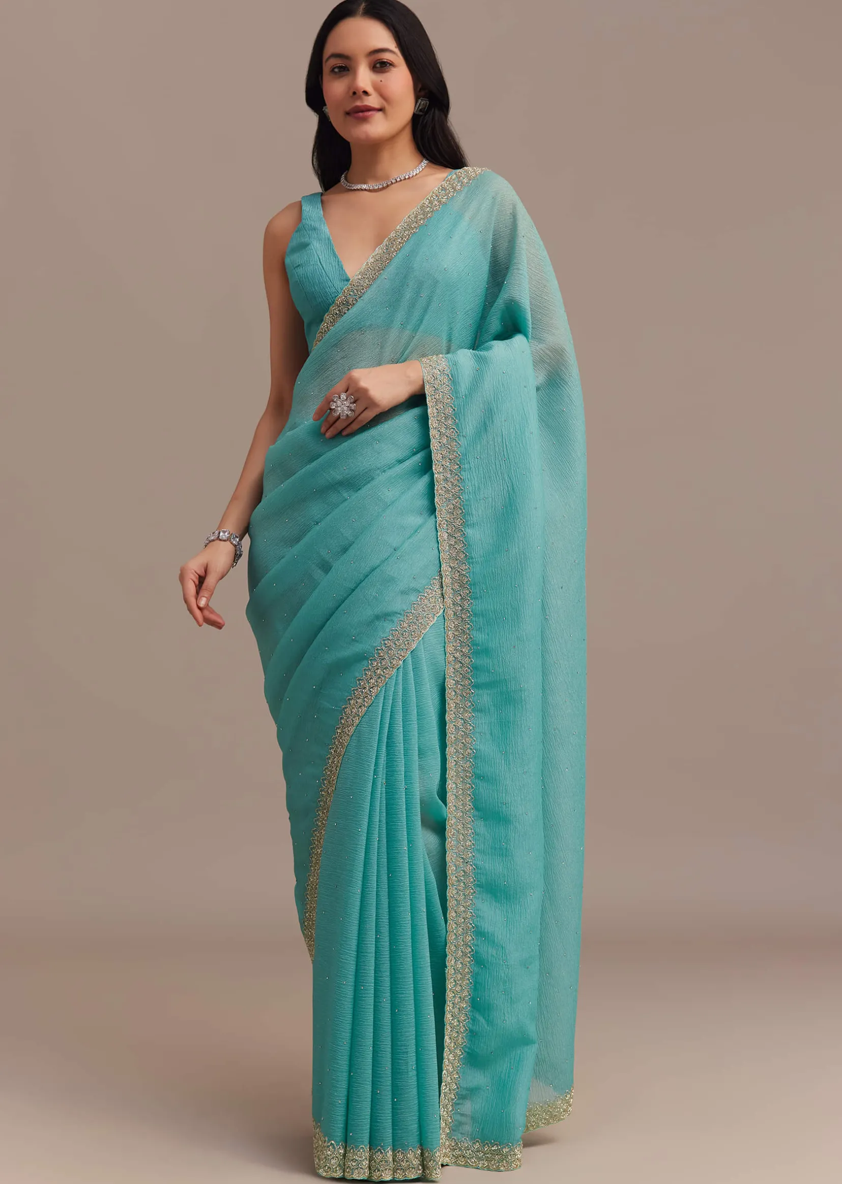 Light Blue Crushed Tissue Saree Embroidered With Cutdana And Stones