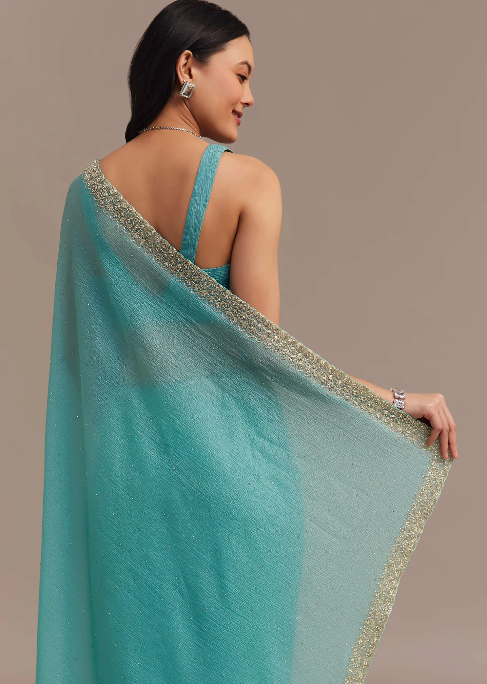 Light Blue Crushed Tissue Saree Embroidered With Cutdana And Stones