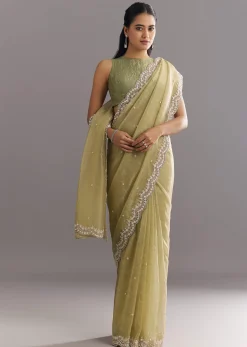 Light Green Glossy Crushed Tissue Saree With Cutdana Sequins Embroidery And Scallop Border