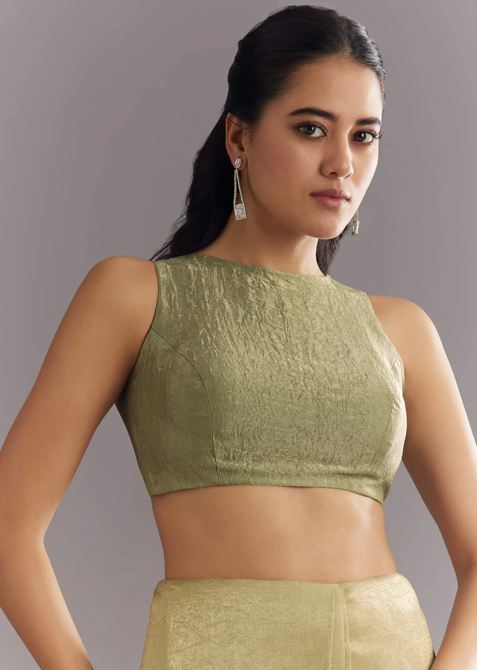 Light Green Glossy Crushed Tissue Saree With Cutdana Sequins Embroidery And Scallop Border