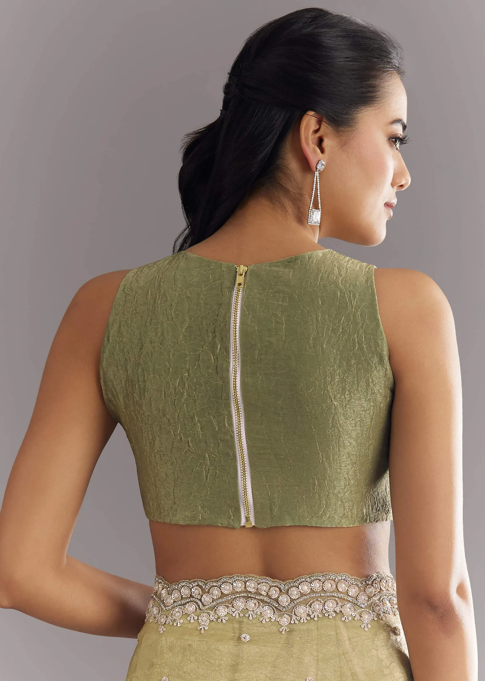 Light Green Glossy Crushed Tissue Saree With Cutdana Sequins Embroidery And Scallop Border