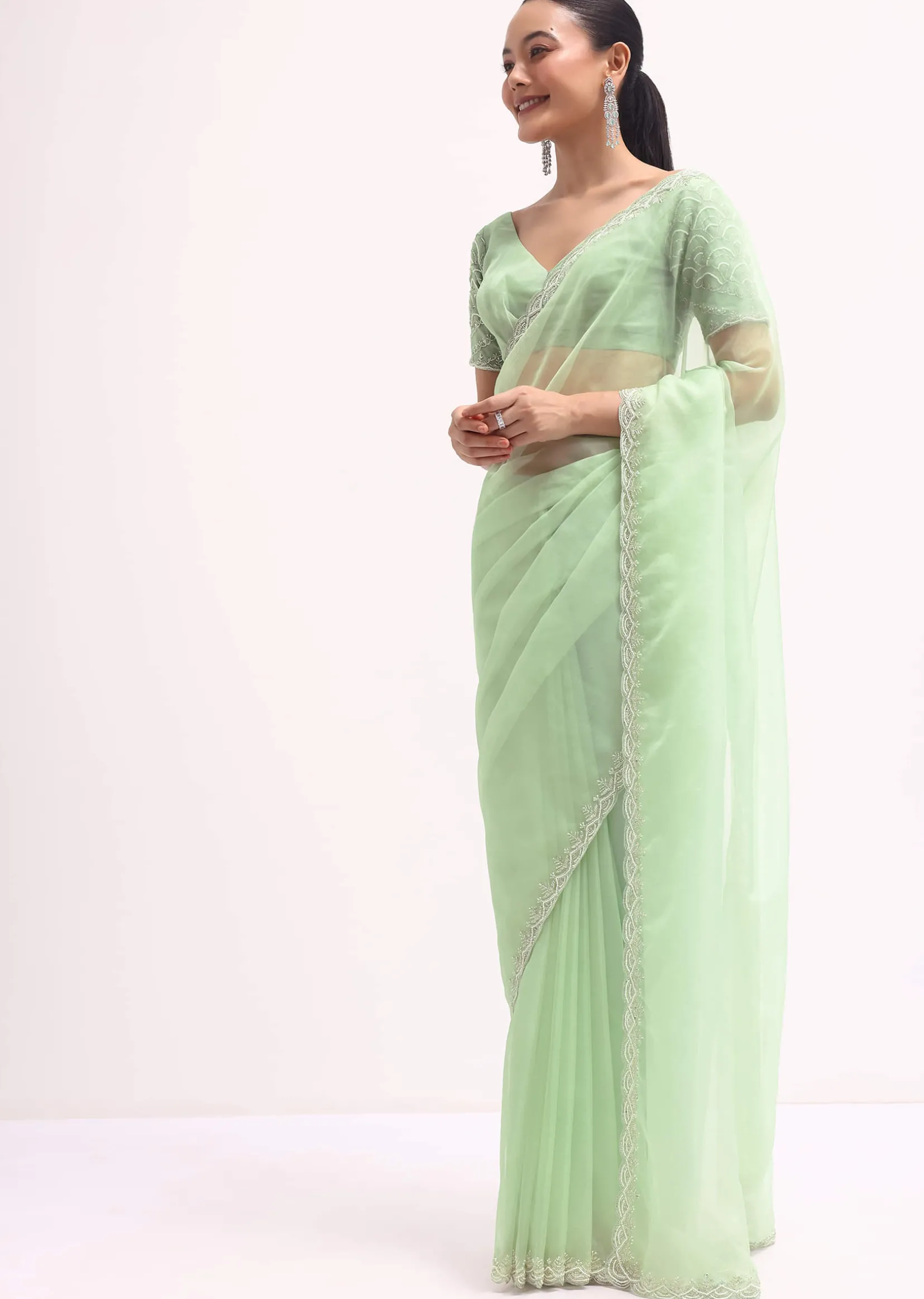 Light Green Scallop Border Saree With Unstitched Blouse
