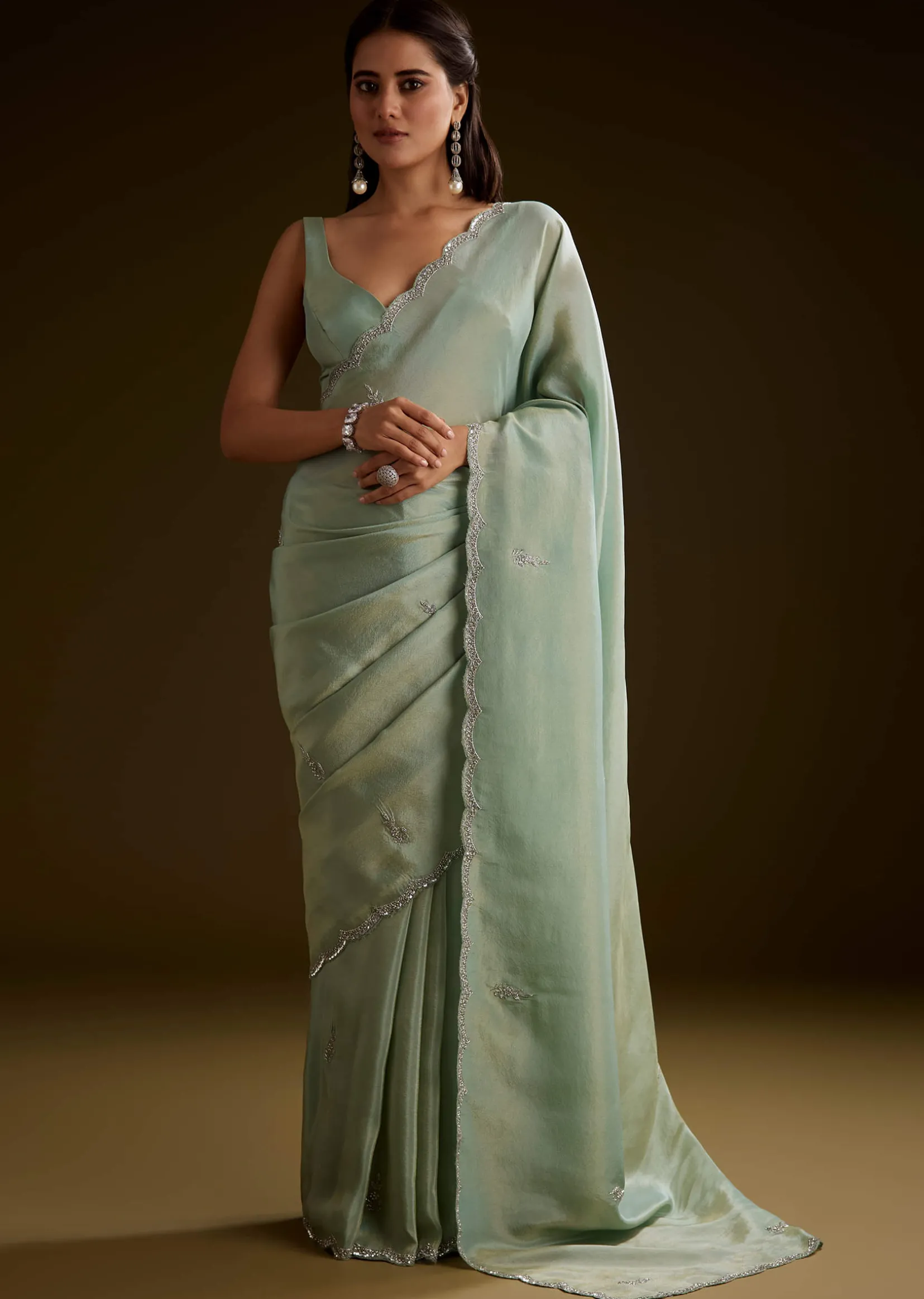 Light Green Tissue Saree With Cutdana Embroidery And Scallop Border
