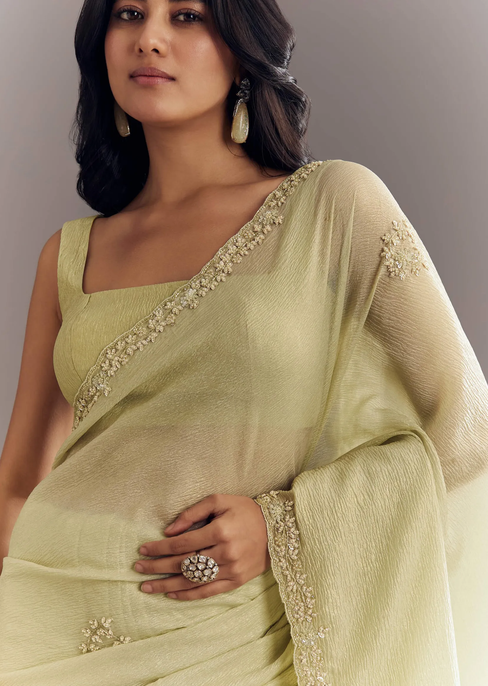 Light Pastel Green Crushed Tissue Saree With Cutdana Sequins And Beads Embroidery