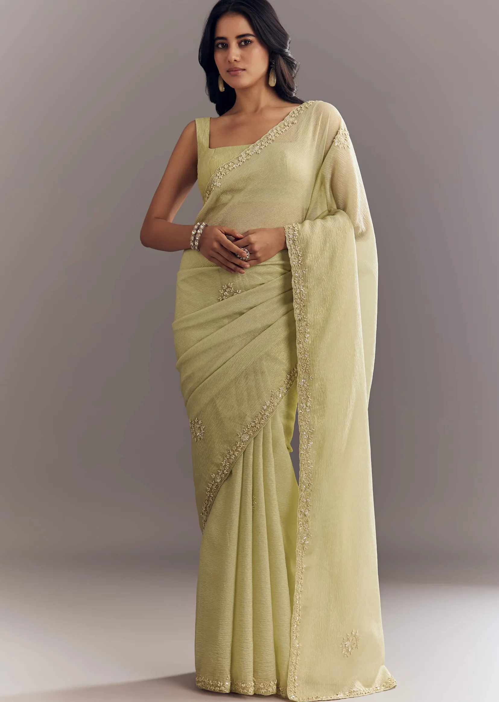 Light Pastel Green Crushed Tissue Saree With Cutdana Sequins And Beads Embroidery