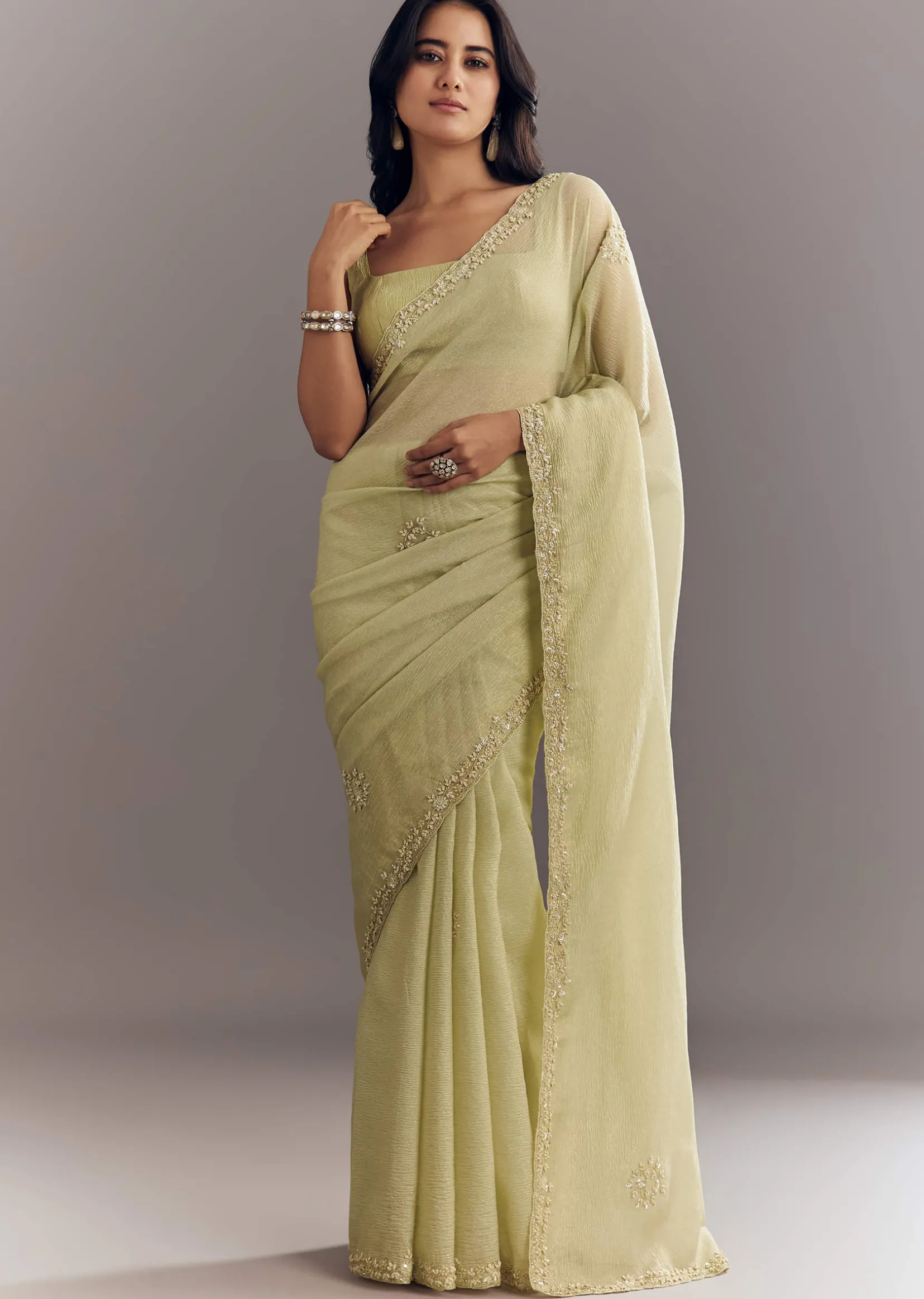 Light Pastel Green Crushed Tissue Saree With Cutdana Sequins And Beads Embroidery