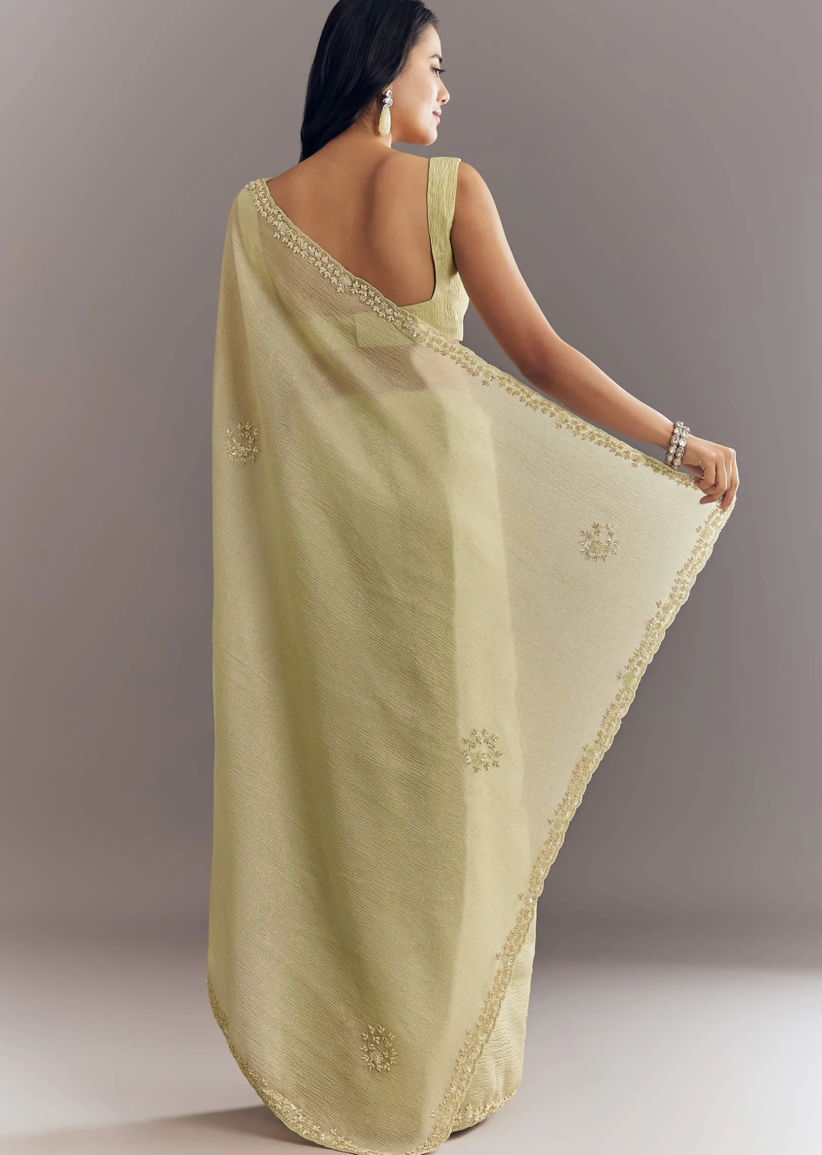 Light Pastel Green Crushed Tissue Saree With Cutdana Sequins And Beads Embroidery