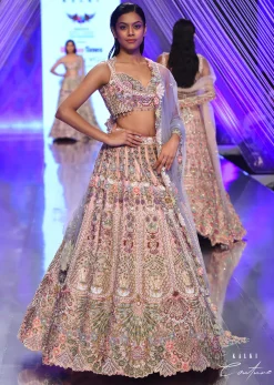 Light Pink Lehenga Set With A Choli In Moti Embroidery, Crop Top Comes In Half Sleeves With Cut Work