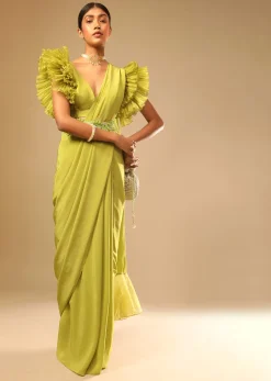 Lime Green Saree In Crepe With Elaborate Ruffle Sleeved Crop Top And Heavy Stone Embroidered Belt