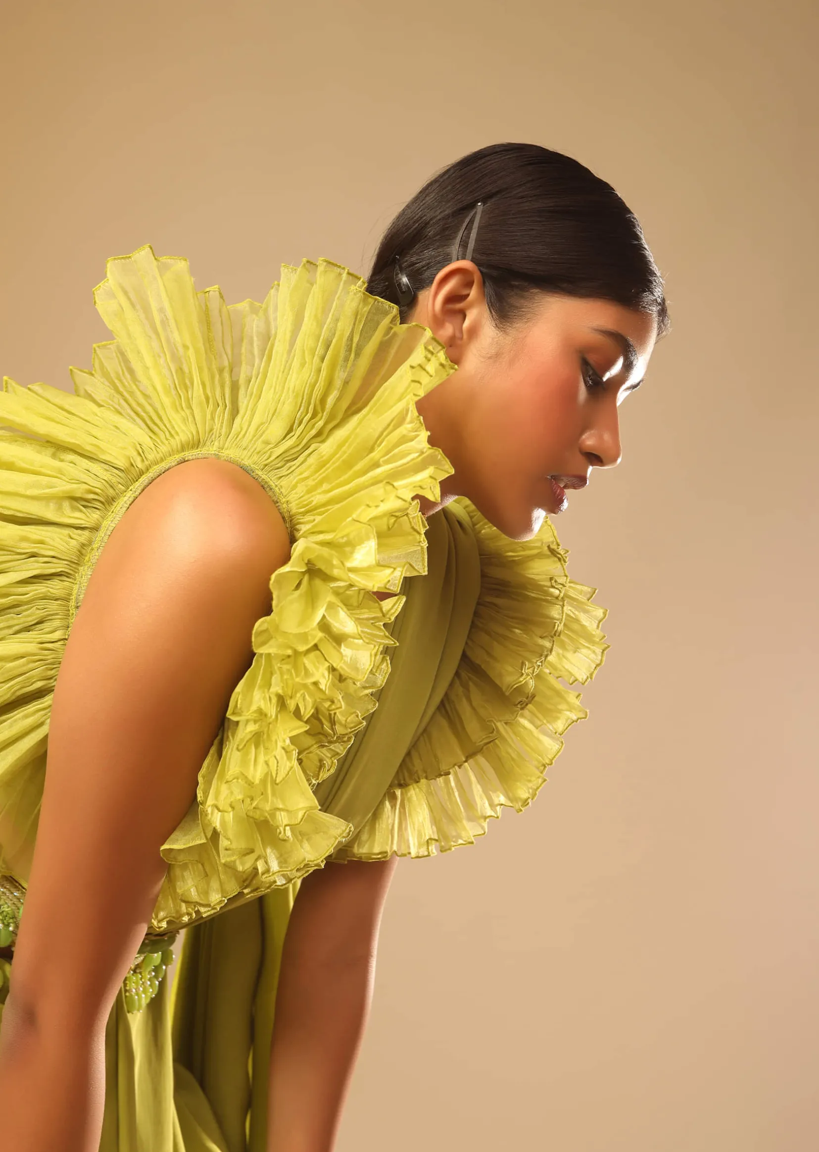 Lime Green Saree In Crepe With Elaborate Ruffle Sleeved Crop Top And Heavy Stone Embroidered Belt