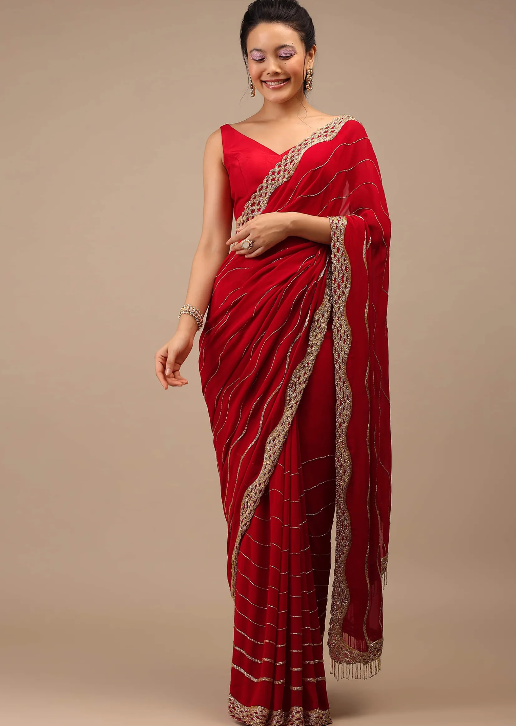 Lipstick Red Georgette Saree Adorned With Golden Zardozi Embroidery & Detailing, And Cut Dana Fringes