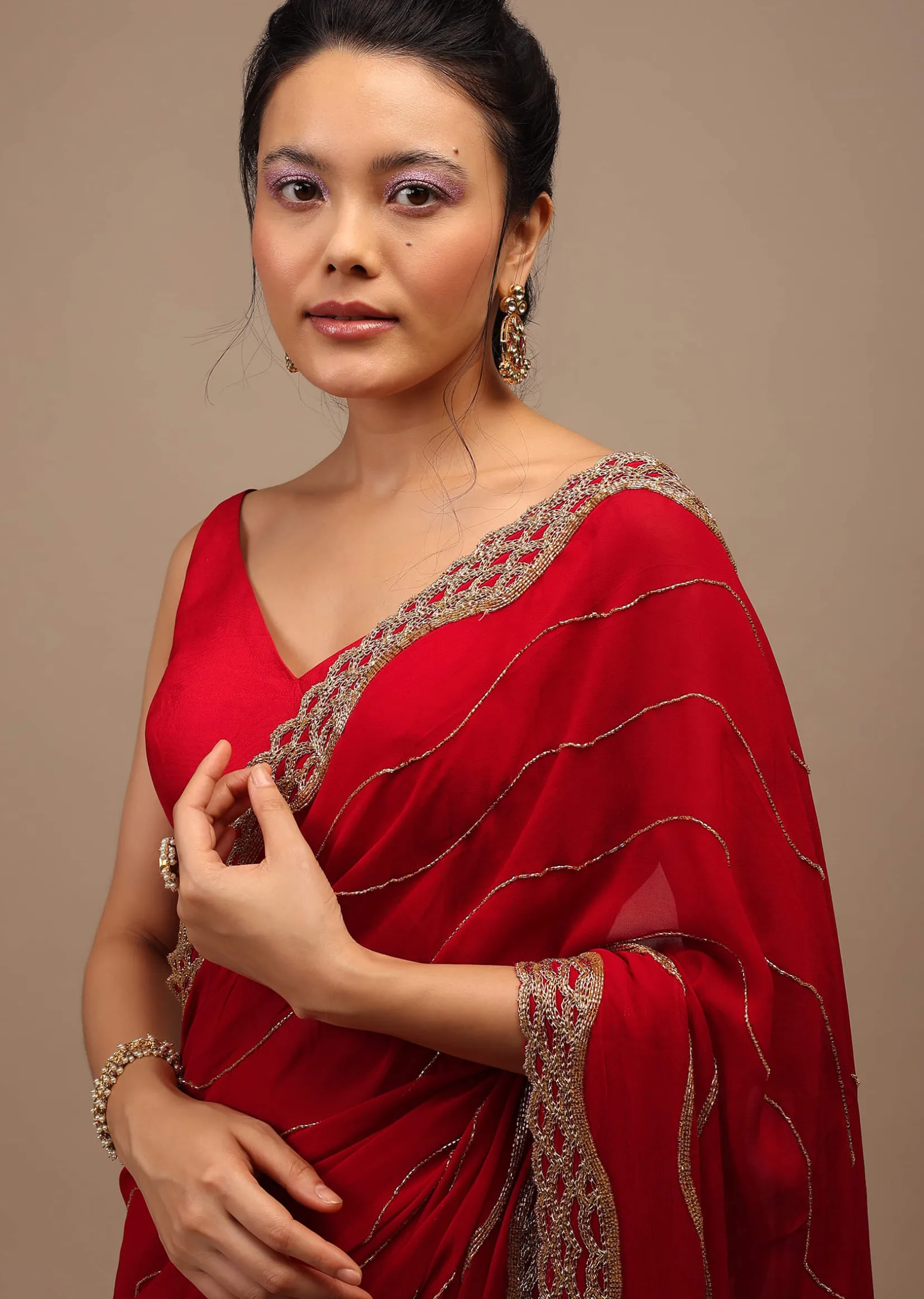 Lipstick Red Georgette Saree Adorned With Golden Zardozi Embroidery & Detailing, And Cut Dana Fringes