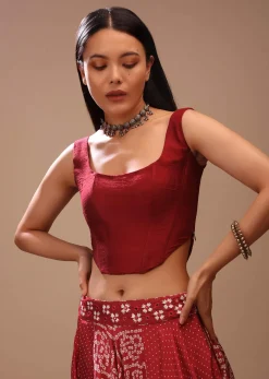 Maroon Corset Blouse In Raw Silk With Scooped Neckline And Tapered High Low Hem