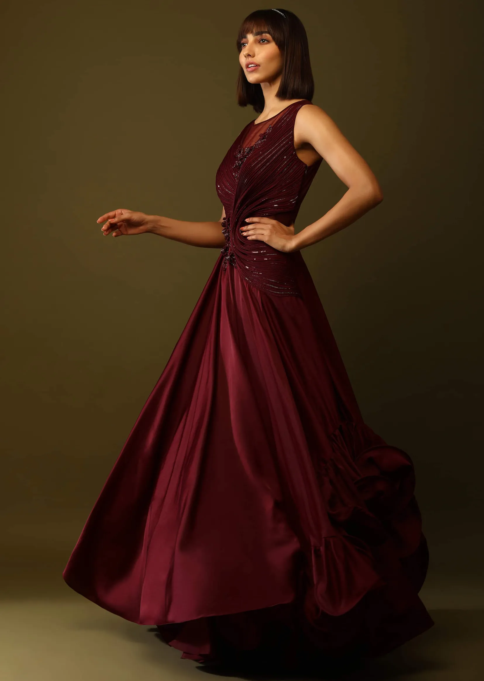 Maroon Gown With Ruched Bodice And Fancy Ruffled Hem