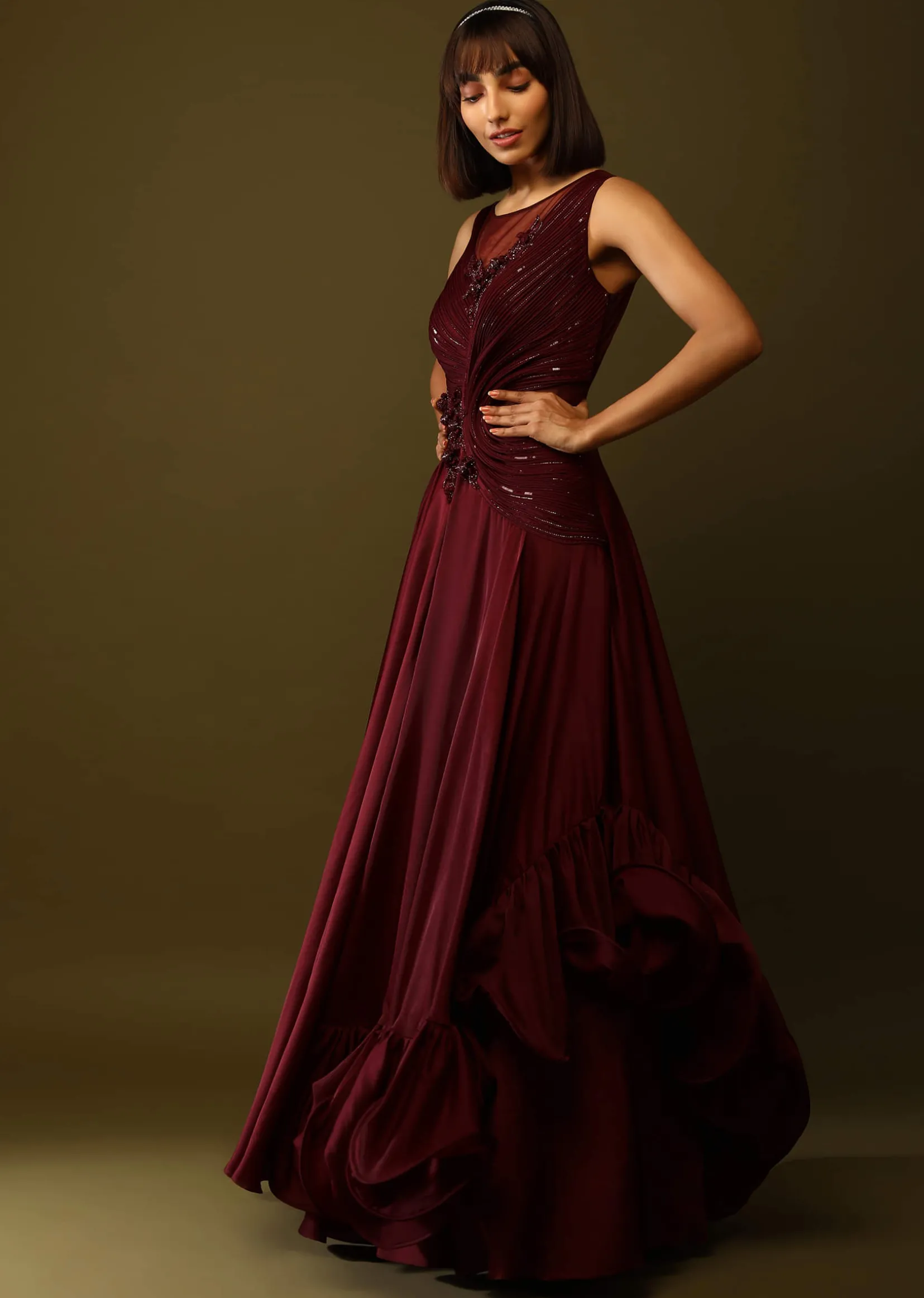 Maroon Gown With Ruched Bodice And Fancy Ruffled Hem