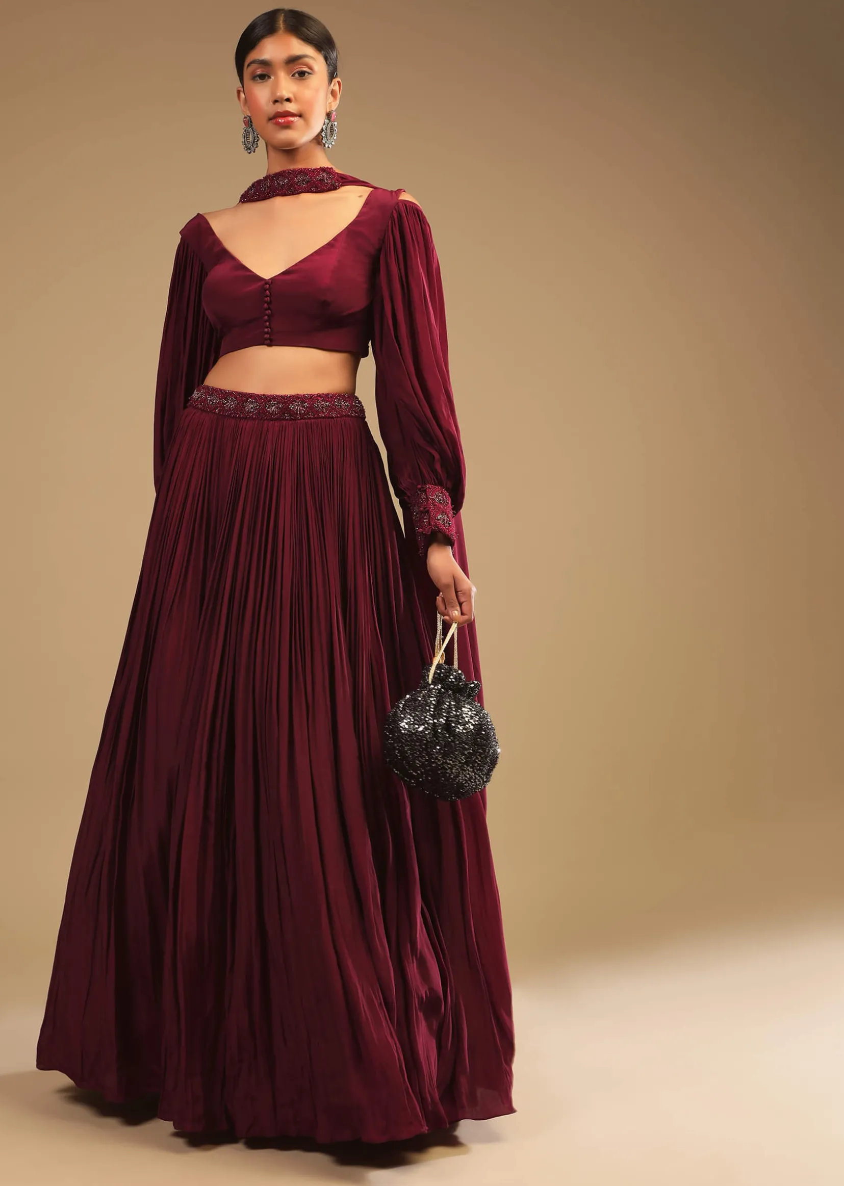 Maroon Lehenga In Crepe With Embroidery Detailing On The Waist And Bishop Sleeved Crop Top