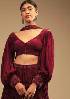Maroon Lehenga In Crepe With Embroidery Detailing On The Waist And Bishop Sleeved Crop Top