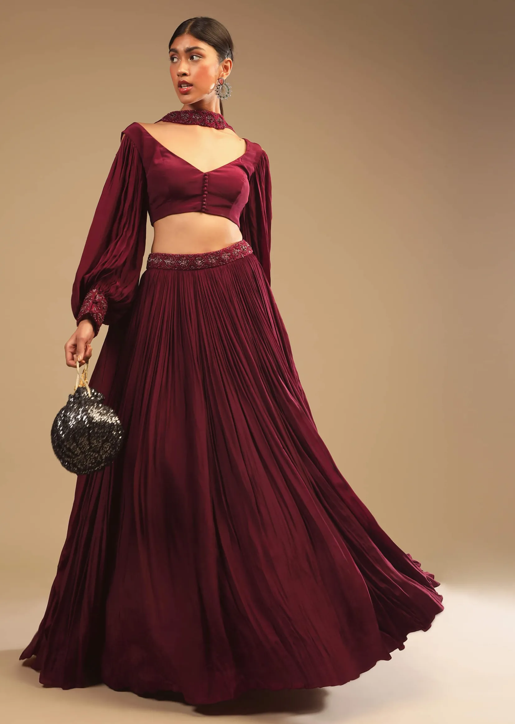 Maroon Lehenga In Crepe With Embroidery Detailing On The Waist And Bishop Sleeved Crop Top