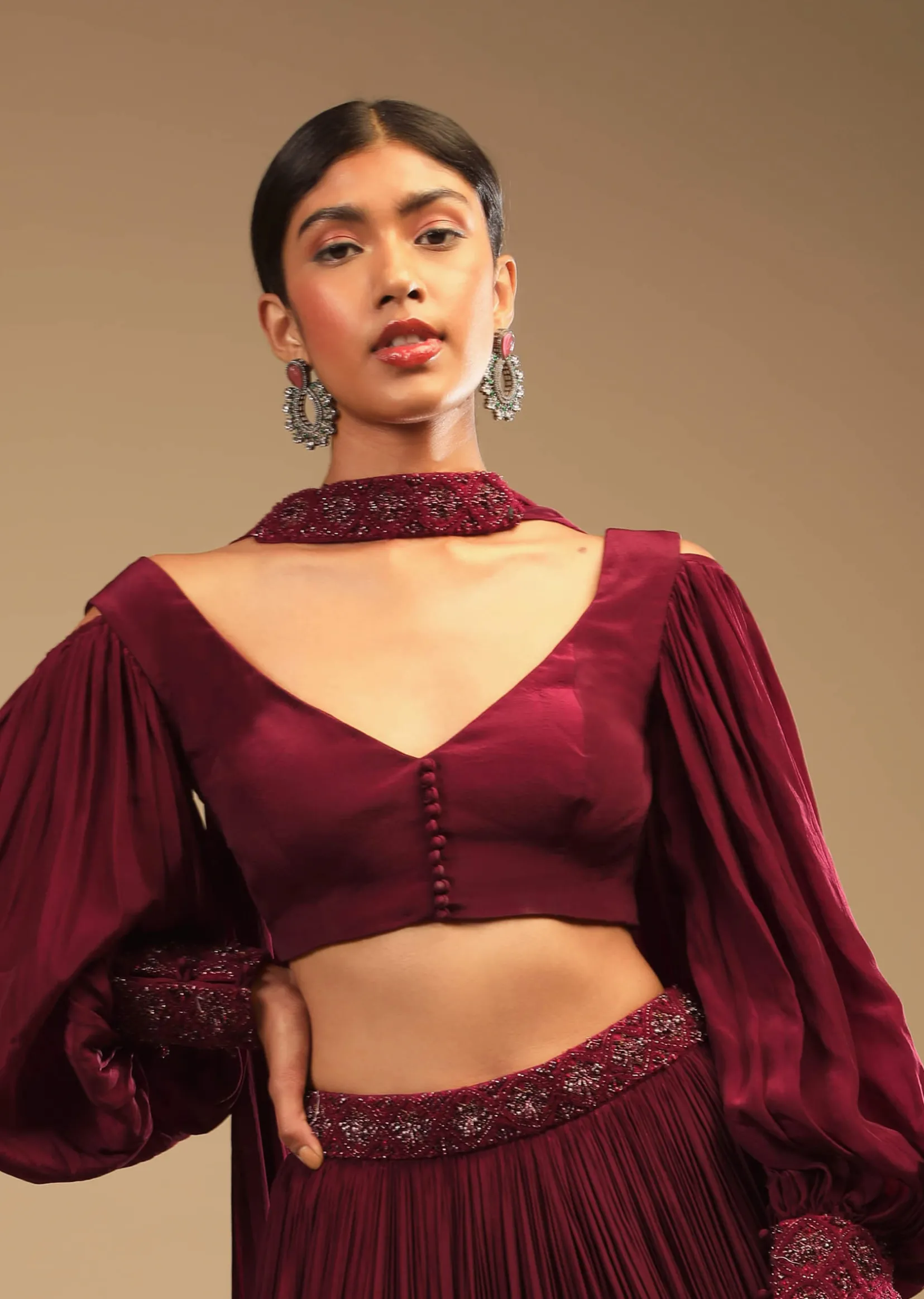 Maroon Lehenga In Crepe With Embroidery Detailing On The Waist And Bishop Sleeved Crop Top