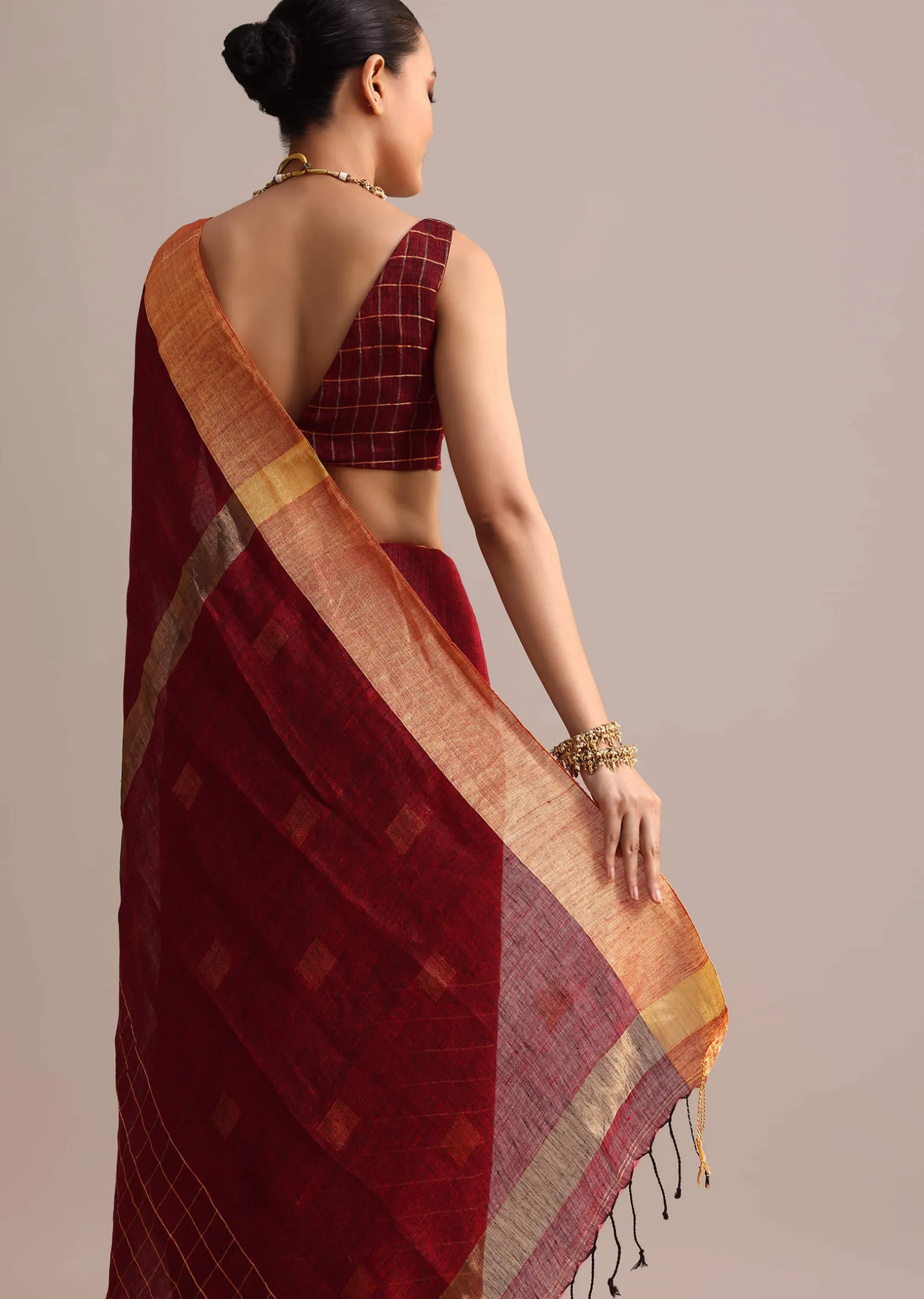 Maroon Linen Woven Saree With Zari Border And Unstitched Blouse