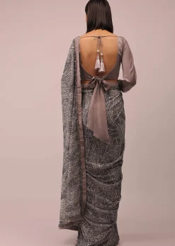 Mauve Purple Satin Saree In Sequins Embroidery With A Crop Top In Full Sleeves And A Round Neckline