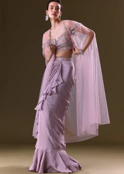 Mauve Ruffled Drape Skirt With Embroidered Blouse And Net Cape