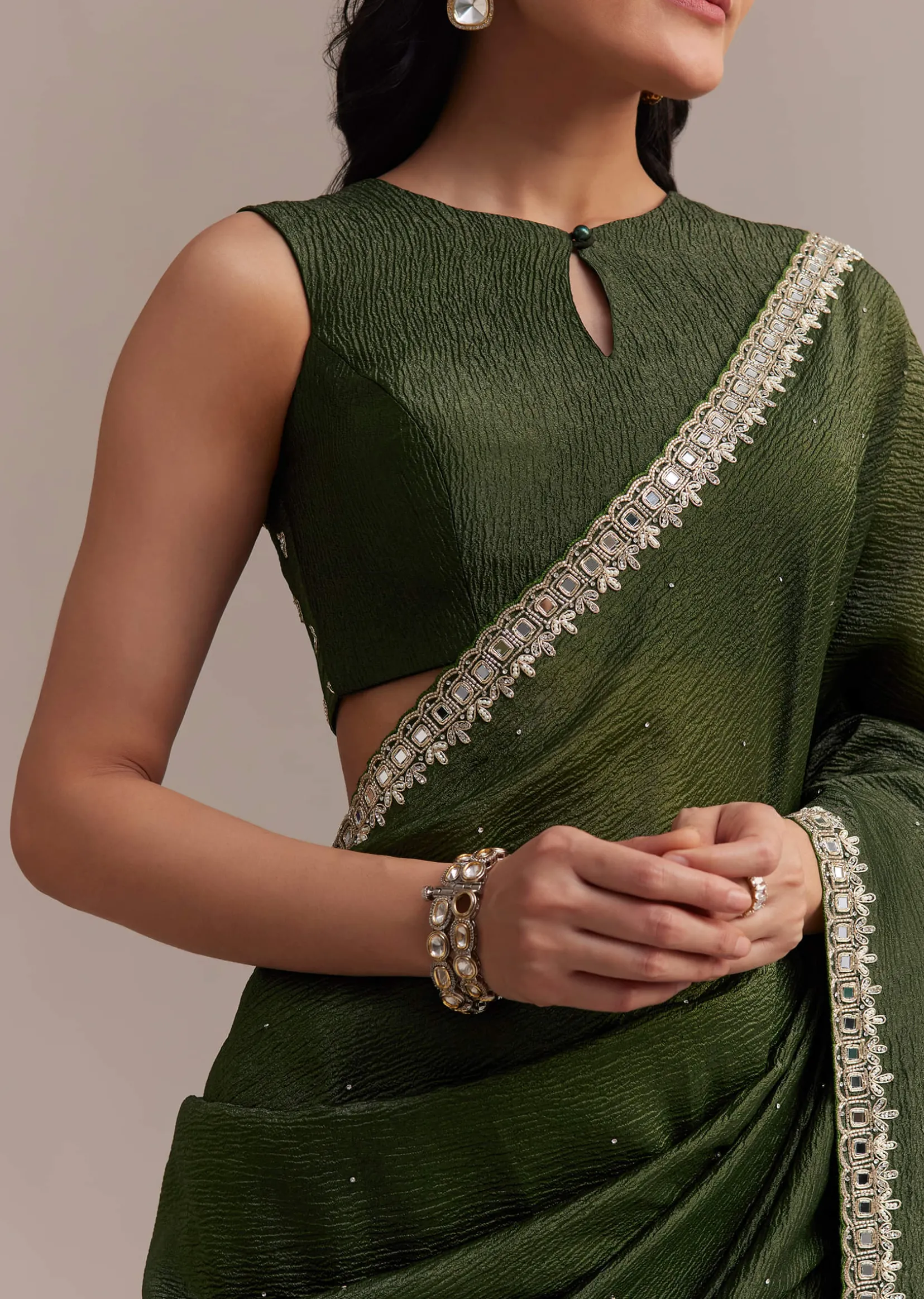 Mehendi Green Crushed Tissue Saree With Embellished Border