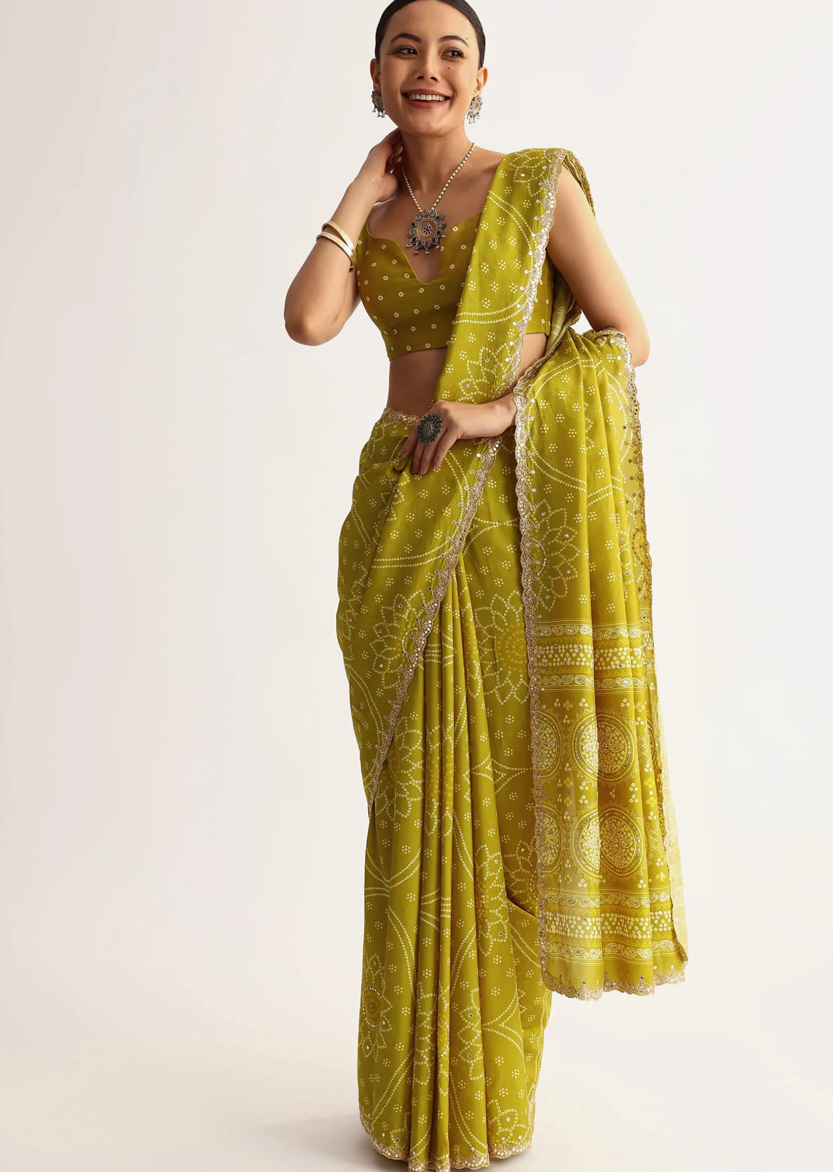 Mehendi Green Patola Printed Georgette Saree With Scallop Border
