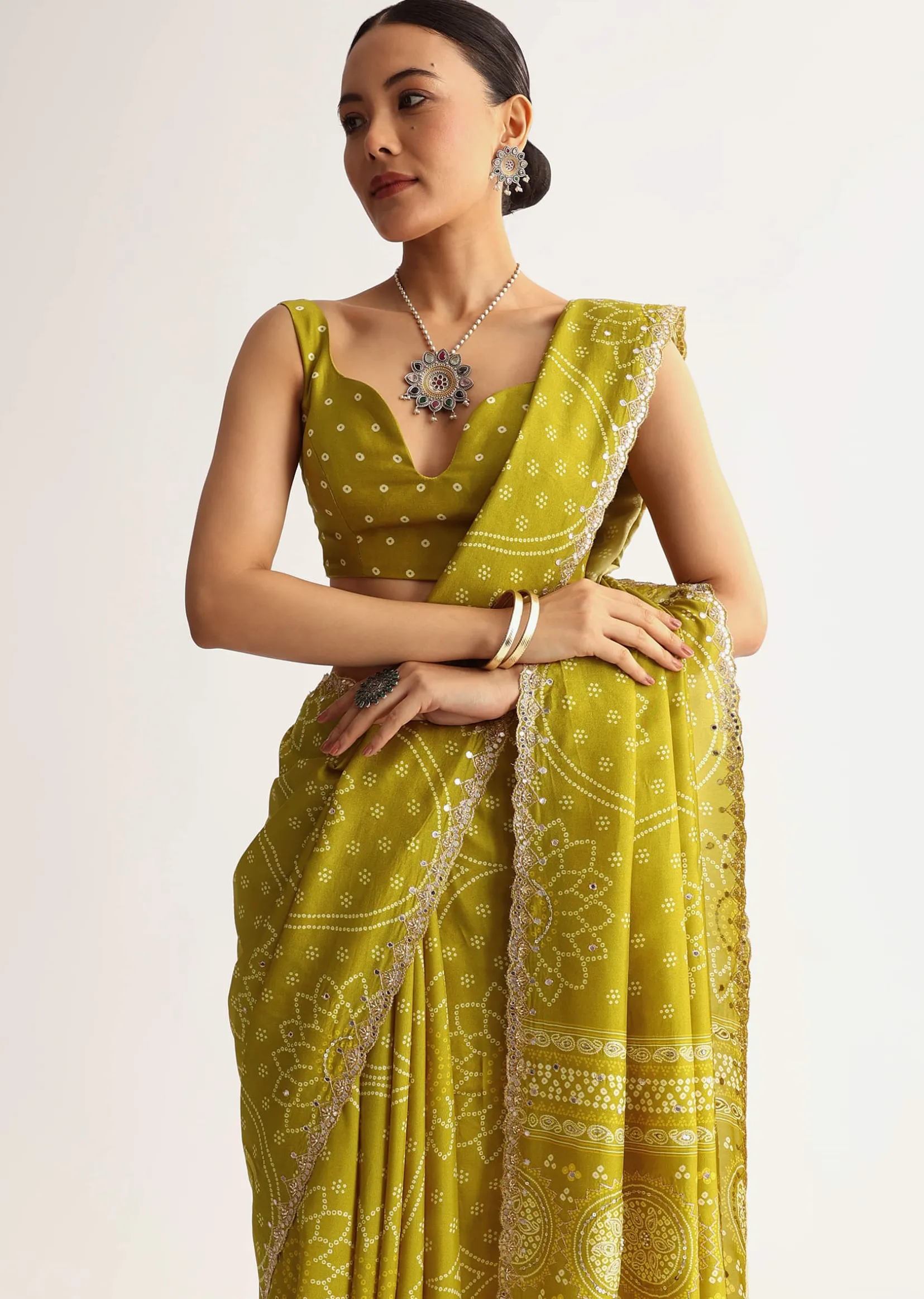 Mehendi Green Patola Printed Georgette Saree With Scallop Border