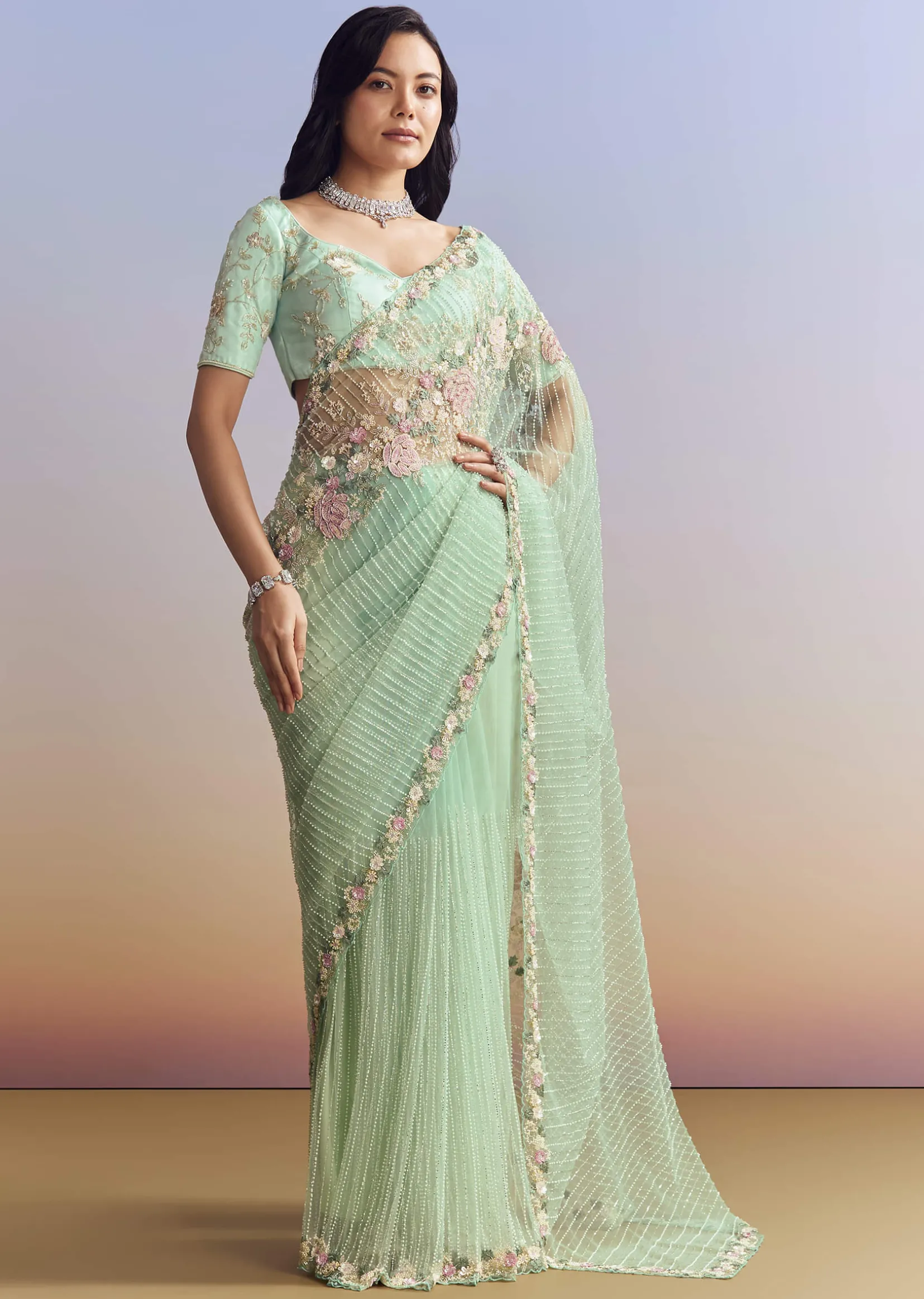 Mint Green Net Saree With Heavily Embroidered Border