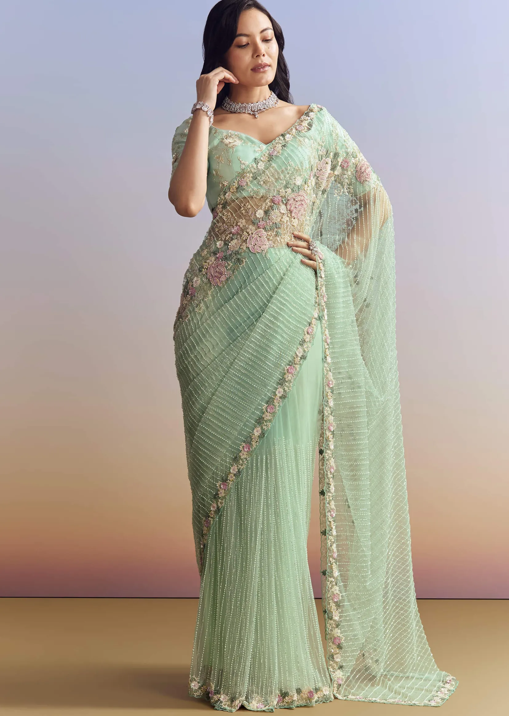 Mint Green Net Saree With Heavily Embroidered Border