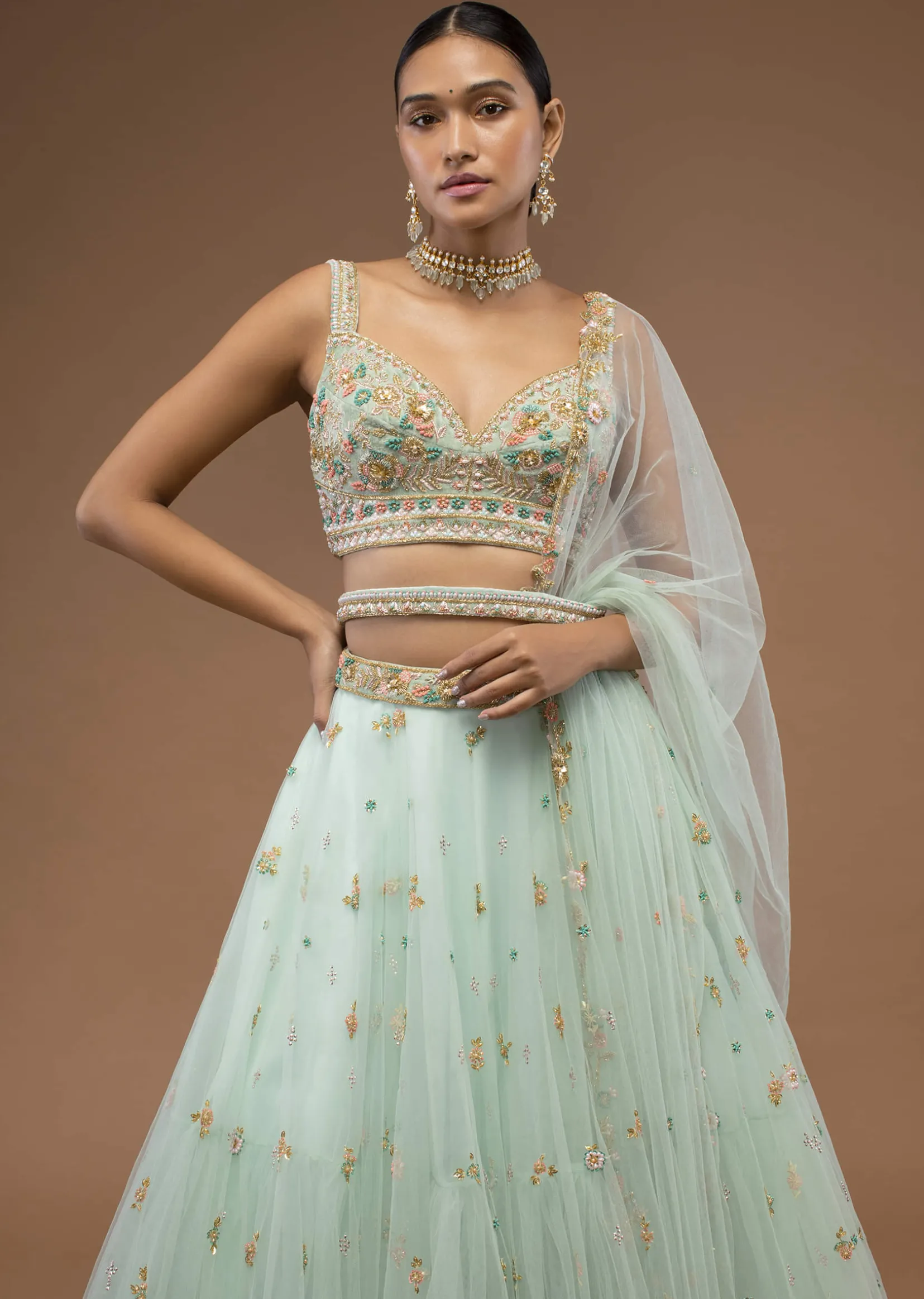 Mint Lehenga And A Crop Top Set Crafted In Net With Sequins And Resham Work