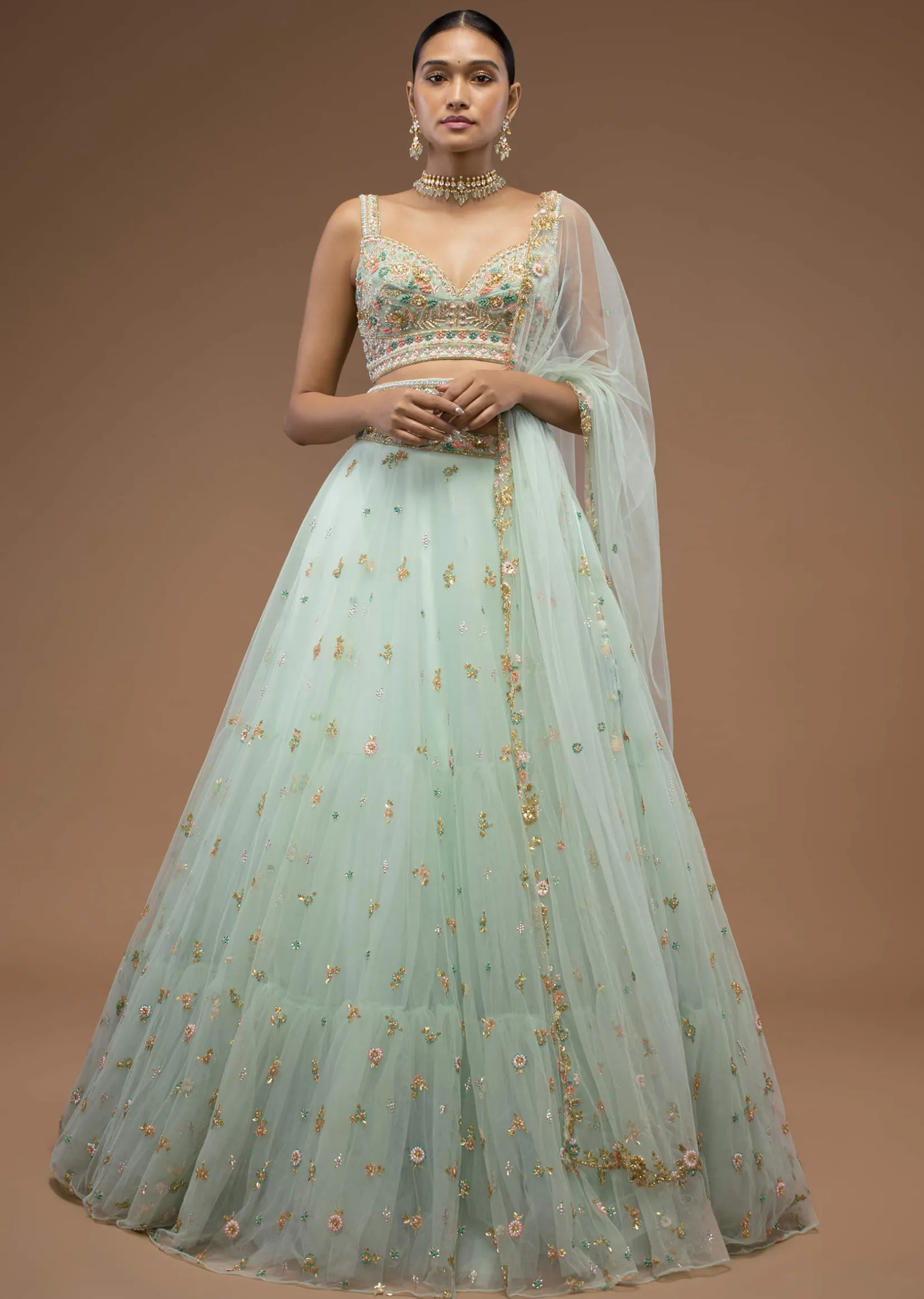 Mint Lehenga And A Crop Top Set Crafted In Net With Sequins And Resham Work