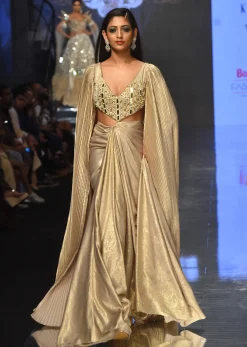 Mocha Brown Gown With A Pre-Pleated Dhoti Skirt Area And Royal Cape Sleeves- NOOR 2022